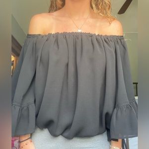 Black boutique off the shoulder blouse